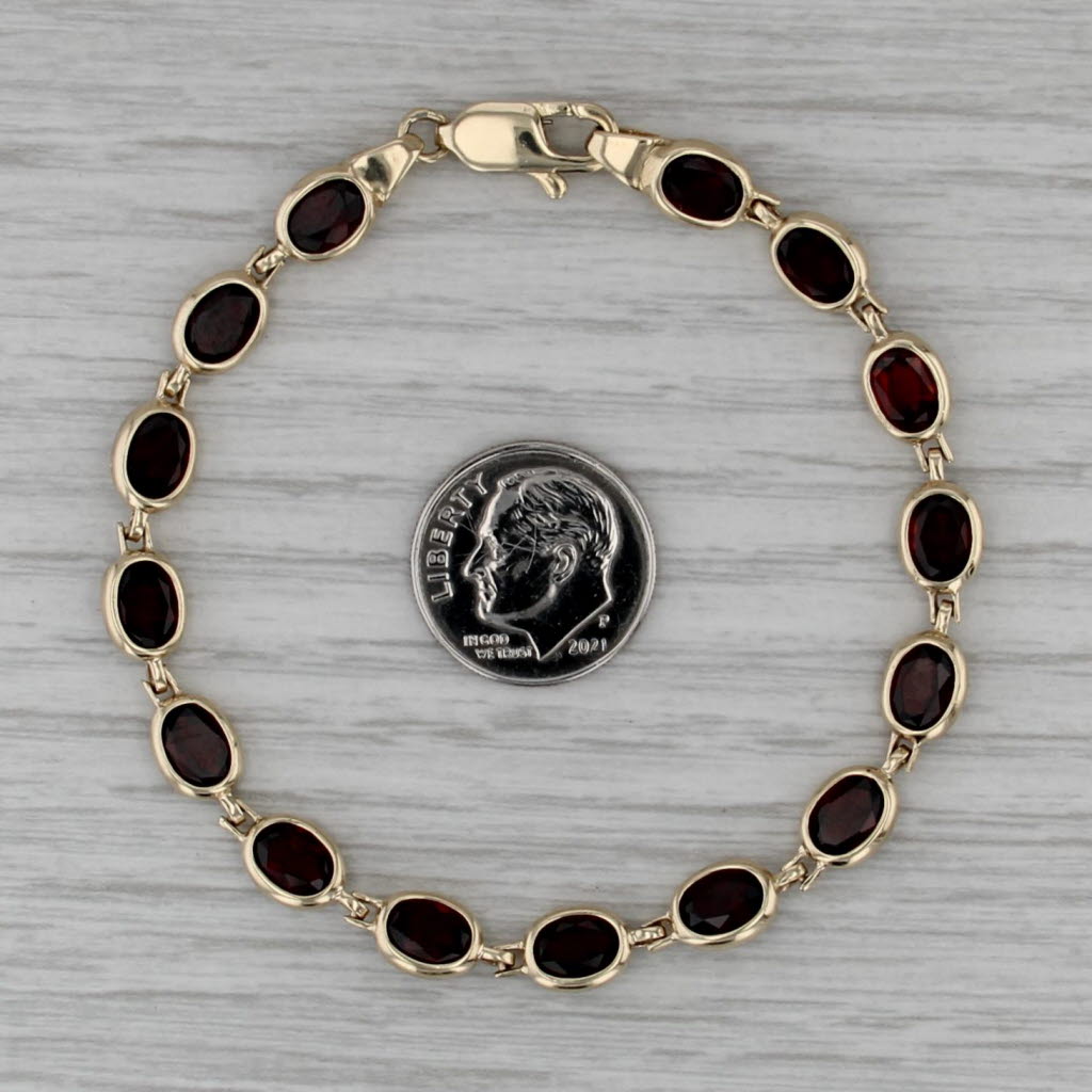 13ctw Garnet Tennis Bracelet 10k Yellow Gold 7" 6.3mm Oval Links