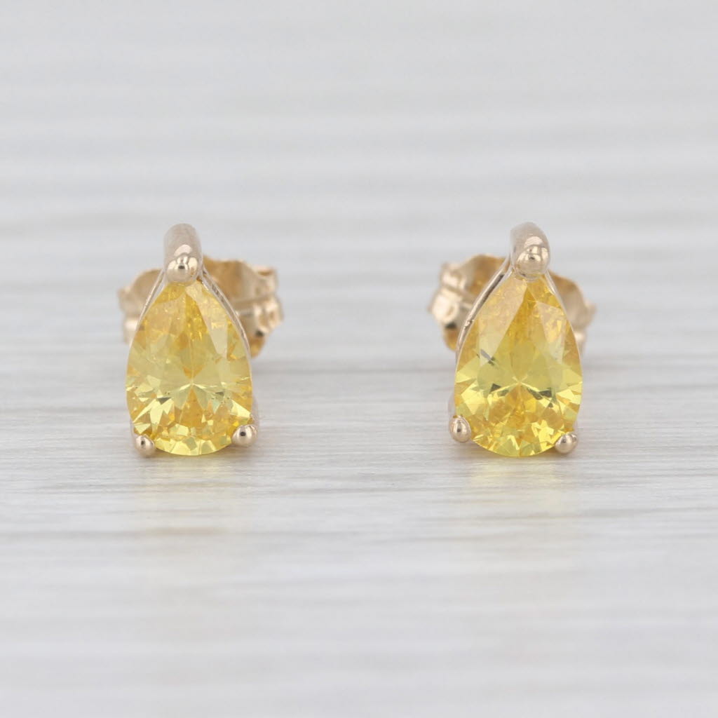 0.70ctw Yellow Cubic Zirconia Pear Stud Earrings 14k Yellow Gold Teardrop