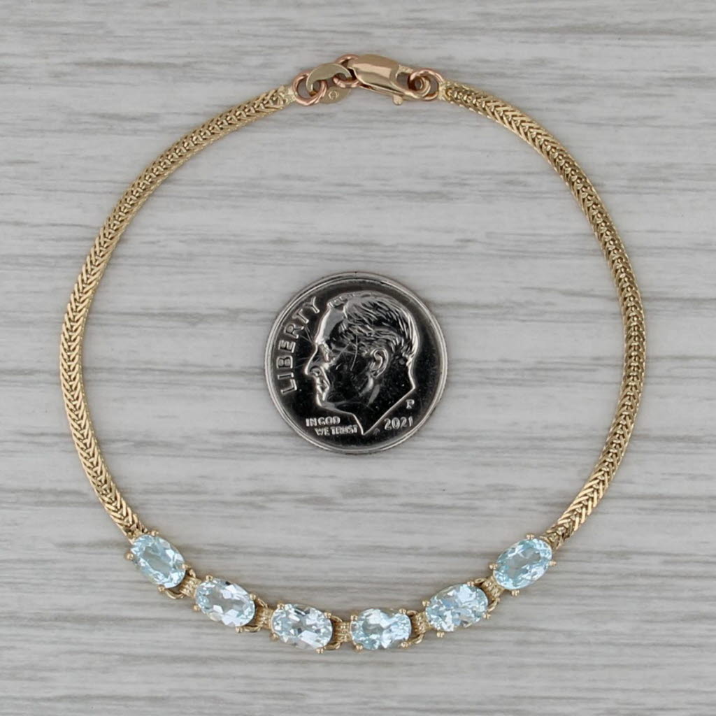 3.10ctw Blue Topaz Bracelet 14k Yellow Gold 6.5" Herringbone Chain