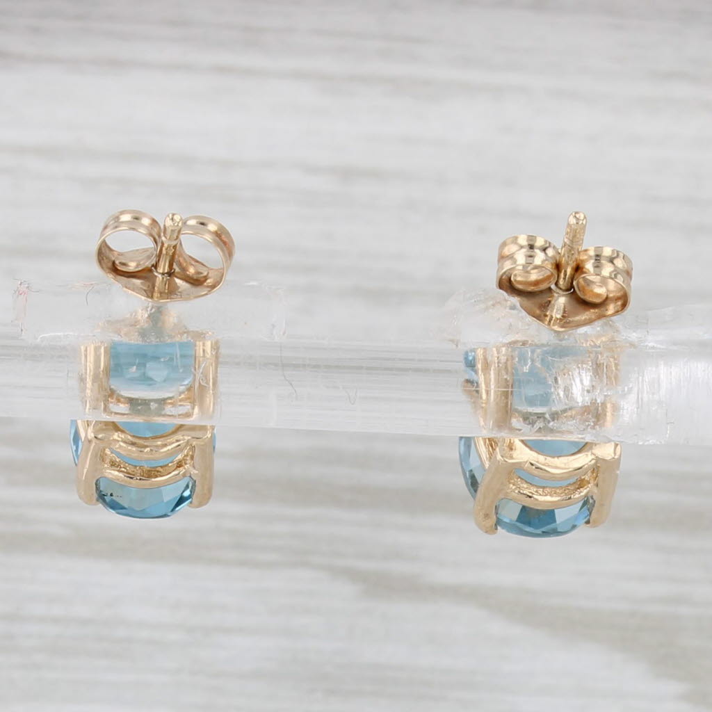 Light Gray 3.20ctw Oval Blue Topaz Solitaire Stud Earrings 14k Yellow Gold
