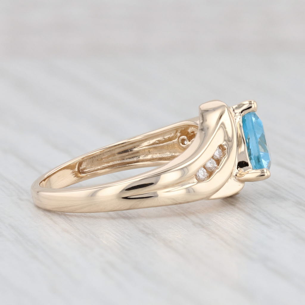 Light Gray 1.50ctw Trillion Blue Topaz Diamond Ring 14k Yellow Gold Size 7 Bypass