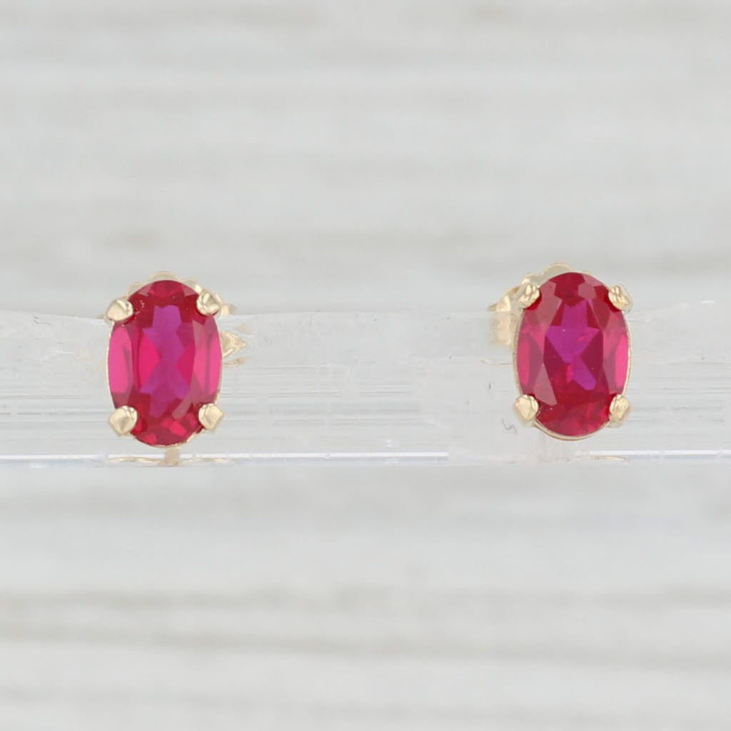 1.10ctw Lab Created Ruby Stud Earrings 14k Yellow Gold July Birthstone