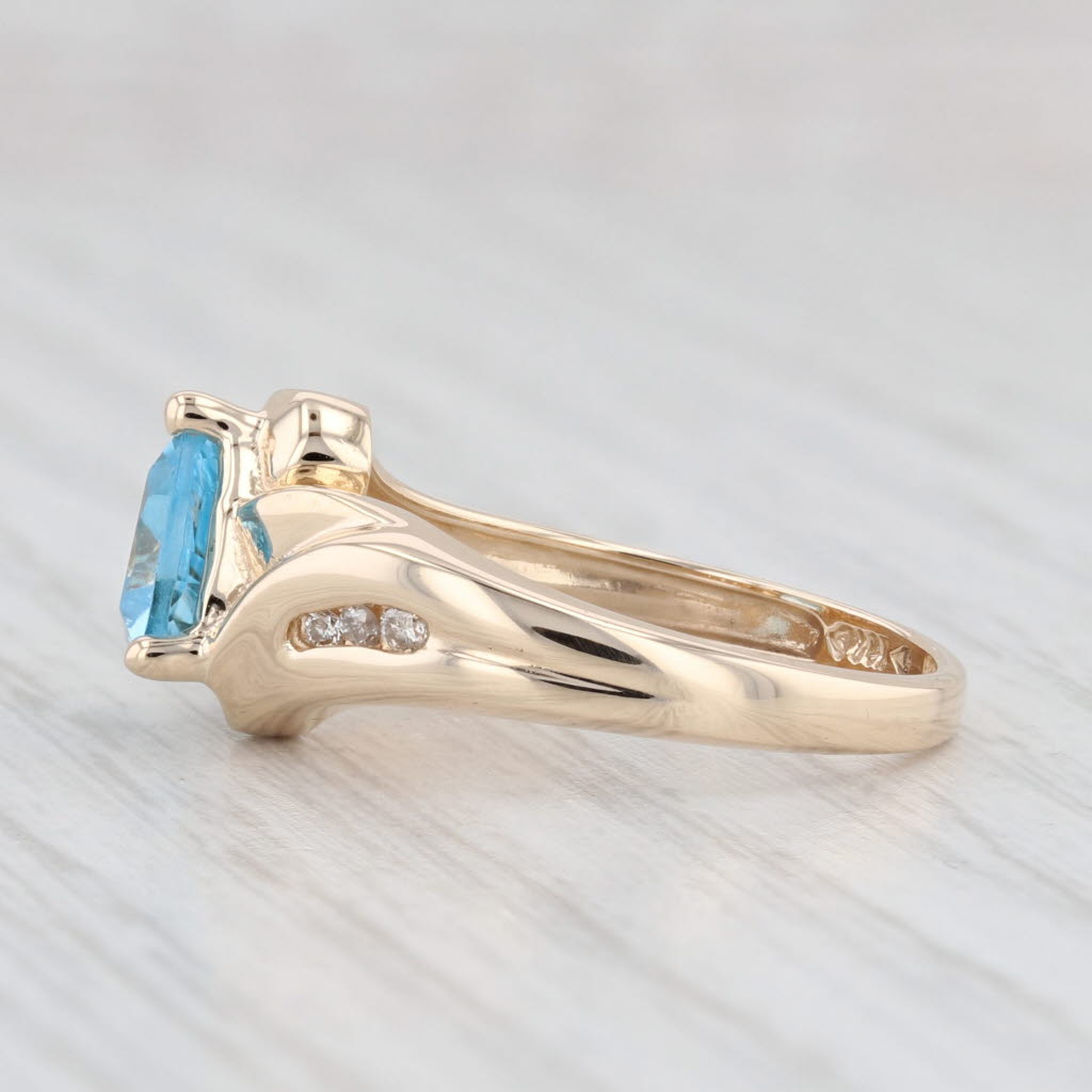 Light Gray 1.50ctw Trillion Blue Topaz Diamond Ring 14k Yellow Gold Size 7 Bypass