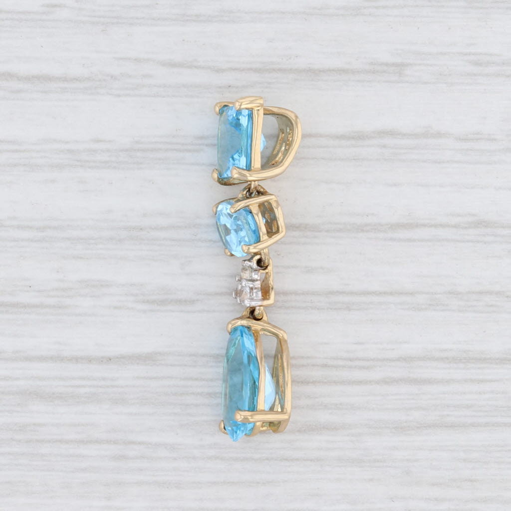 Light Gray New 5.89ctw Blue Topaz Synthetic White Sapphire Drop Pendant 10k Yellow Gold