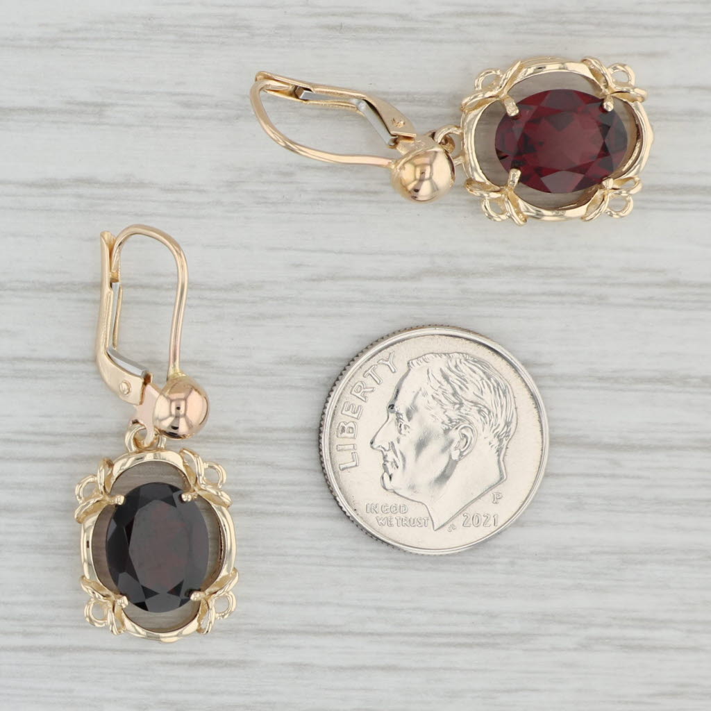 Gray 5.30ctw Garnet Oval Dangle Earrings 14k Yellow Gold January Birthstone