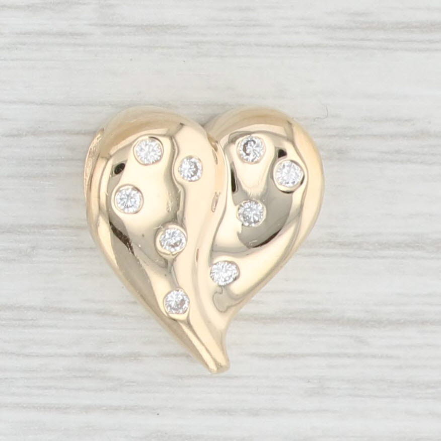 14k Yellow Gold Floating Heart Cut Diamond Stud Earrings
