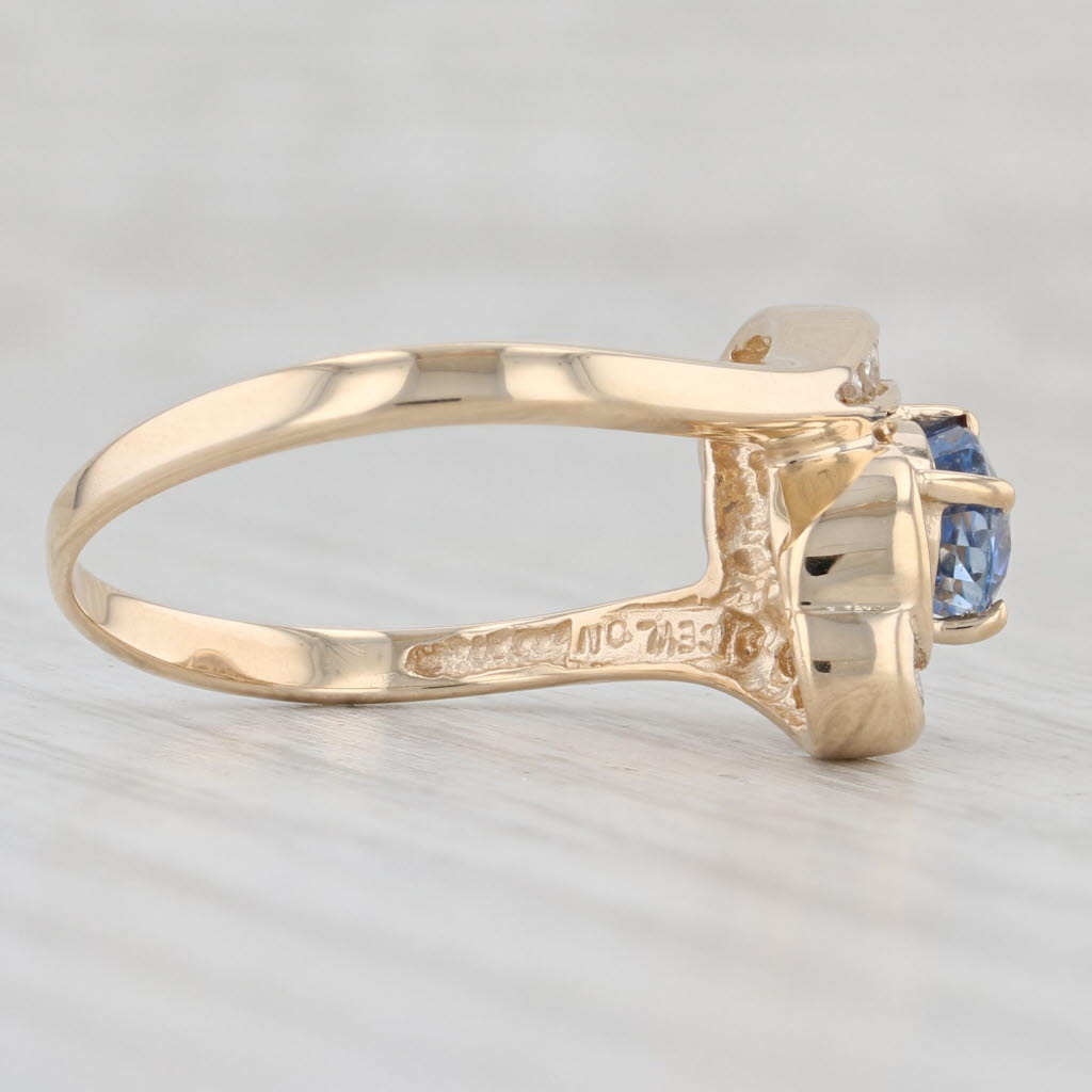 Light Gray 1.43ctw Light Blue Oval Sapphire Diamond Bypass Ring 14k Yellow Gold Size 7.25