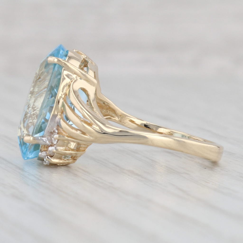 Light Gray 10.29ctw Oval Blue Topaz Diamond Ring 14k Yellow Gold Size 7.25 Bypass