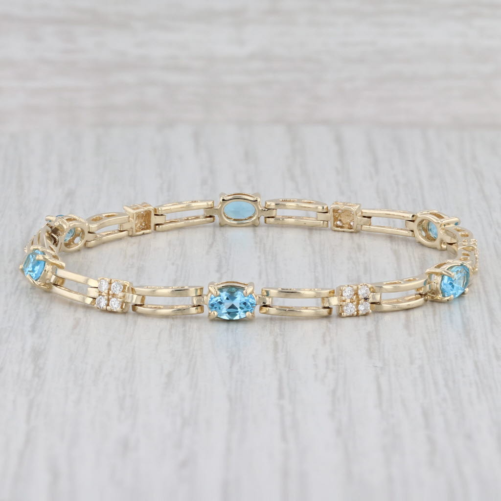 Light Gray 3.82ctw Oval Blue Topaz Diamond Tennis Bracelet 14k Yellow Gold 6.75" 4.5mm