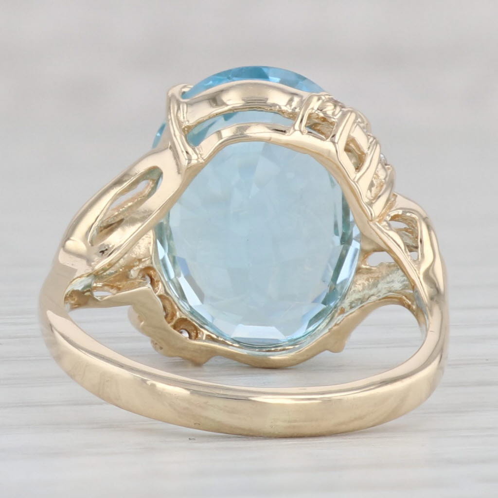 Light Gray 10.29ctw Oval Blue Topaz Diamond Ring 14k Yellow Gold Size 7.25 Bypass