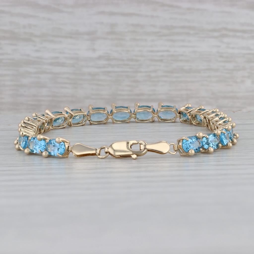 Gray 13ctw Blue Topaz Tennis Bracelet 14k Yellow Gold 7" 5.3mm