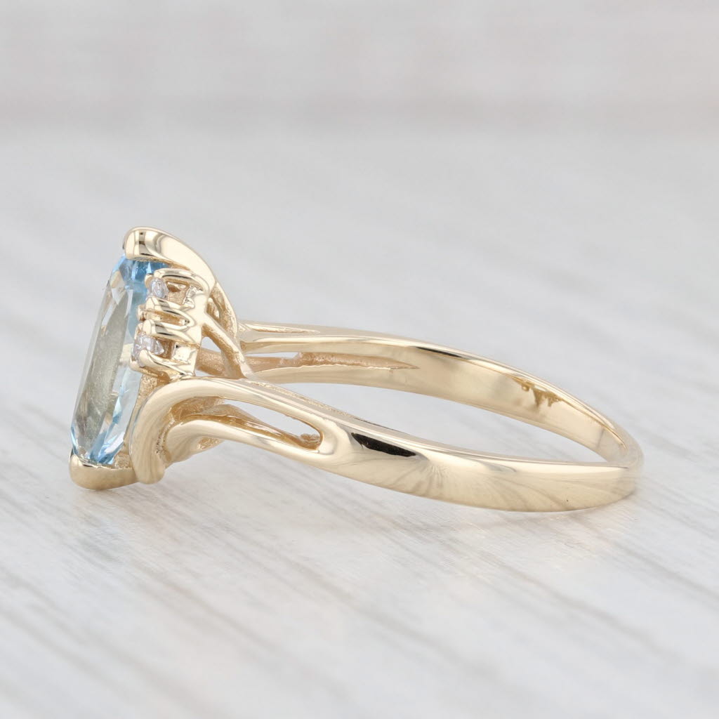 Light Gray 1.15ctw Marquise Aquamarine Diamond Bypass Ring 14k Yellow Gold Size 6.75