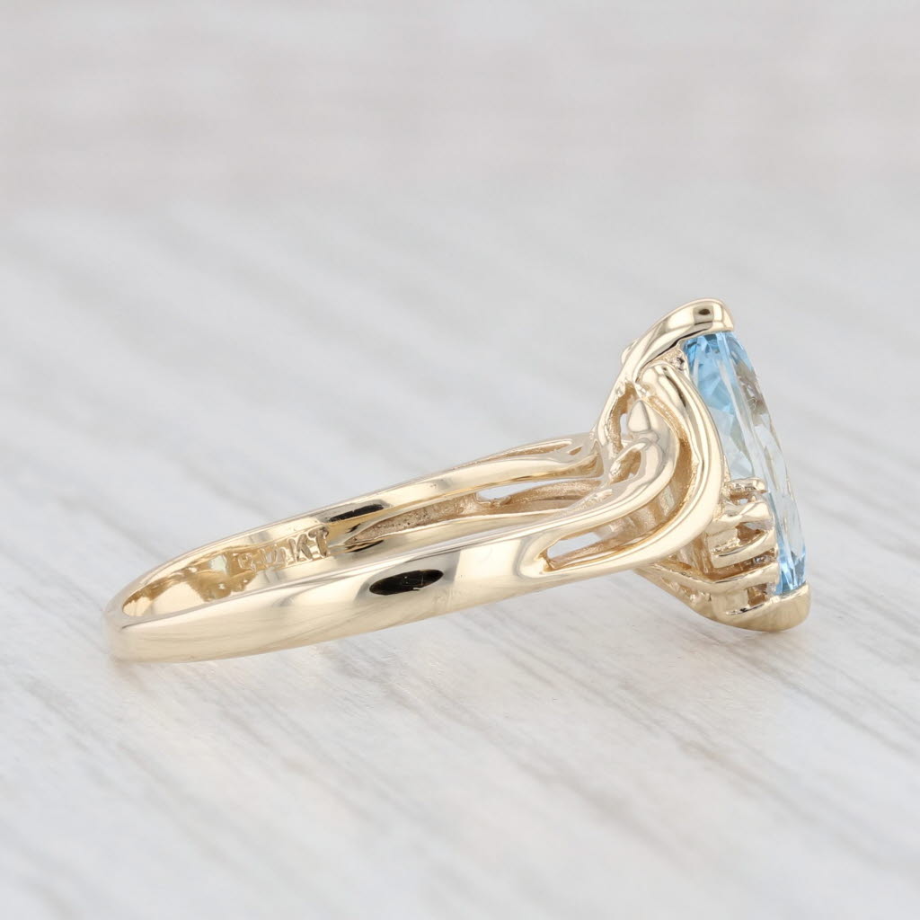 Light Gray 1.15ctw Marquise Aquamarine Diamond Bypass Ring 14k Yellow Gold Size 6.75