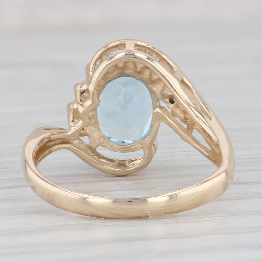 Light Gray 2.38ctw Blue Topaz Diamond Bypass Ring 14k Yellow Gold Size 6.75
