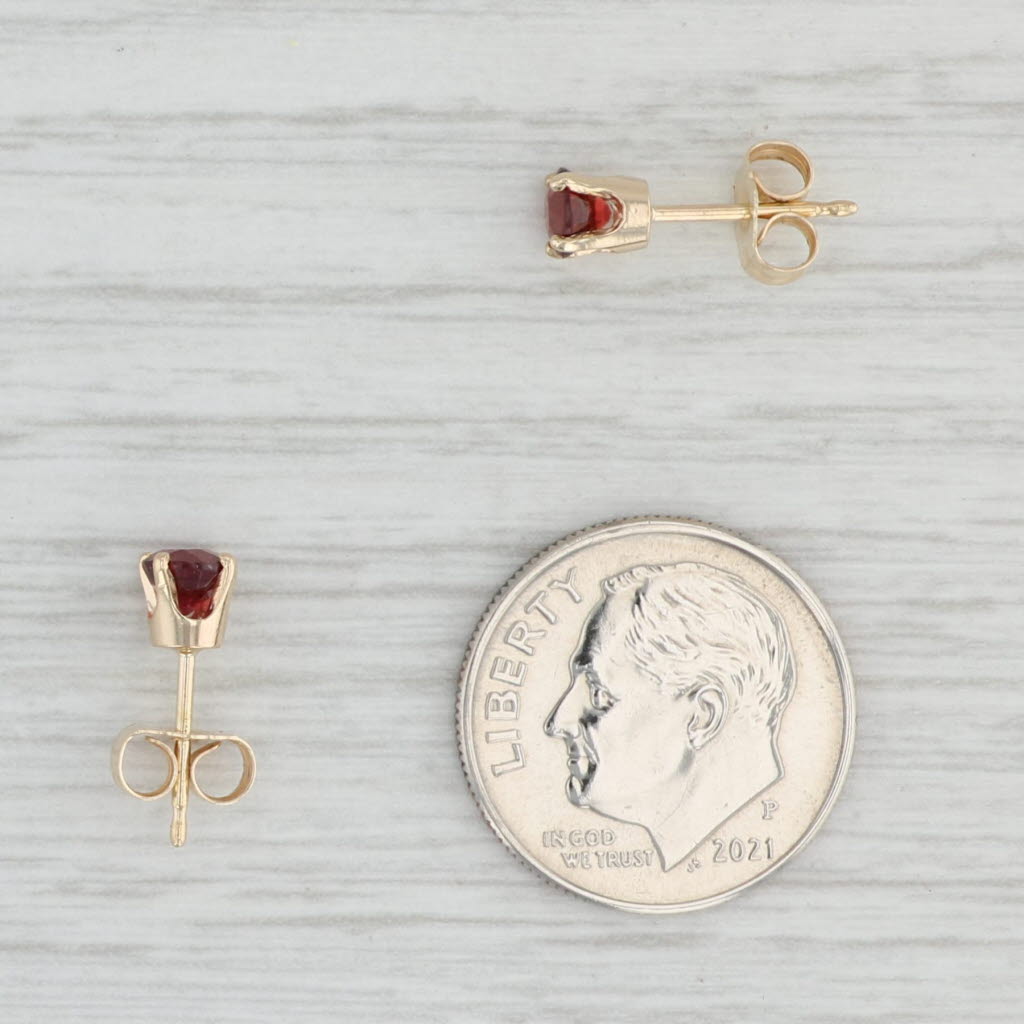 Light Gray 0.68ctw Garnet Solitaire Stud Earrings 14k Yellow Gold January Birthstone