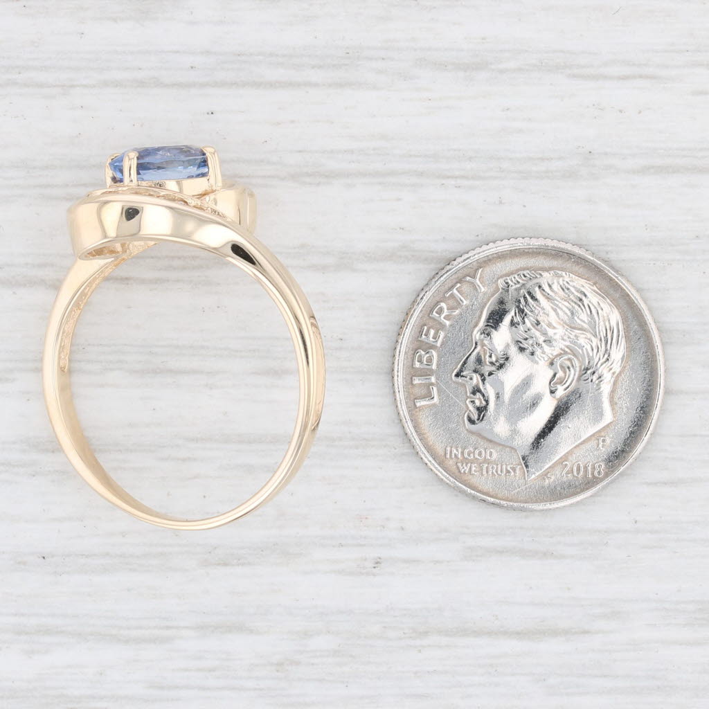 Light Gray 1.43ctw Light Blue Oval Sapphire Diamond Bypass Ring 14k Yellow Gold Size 7.25