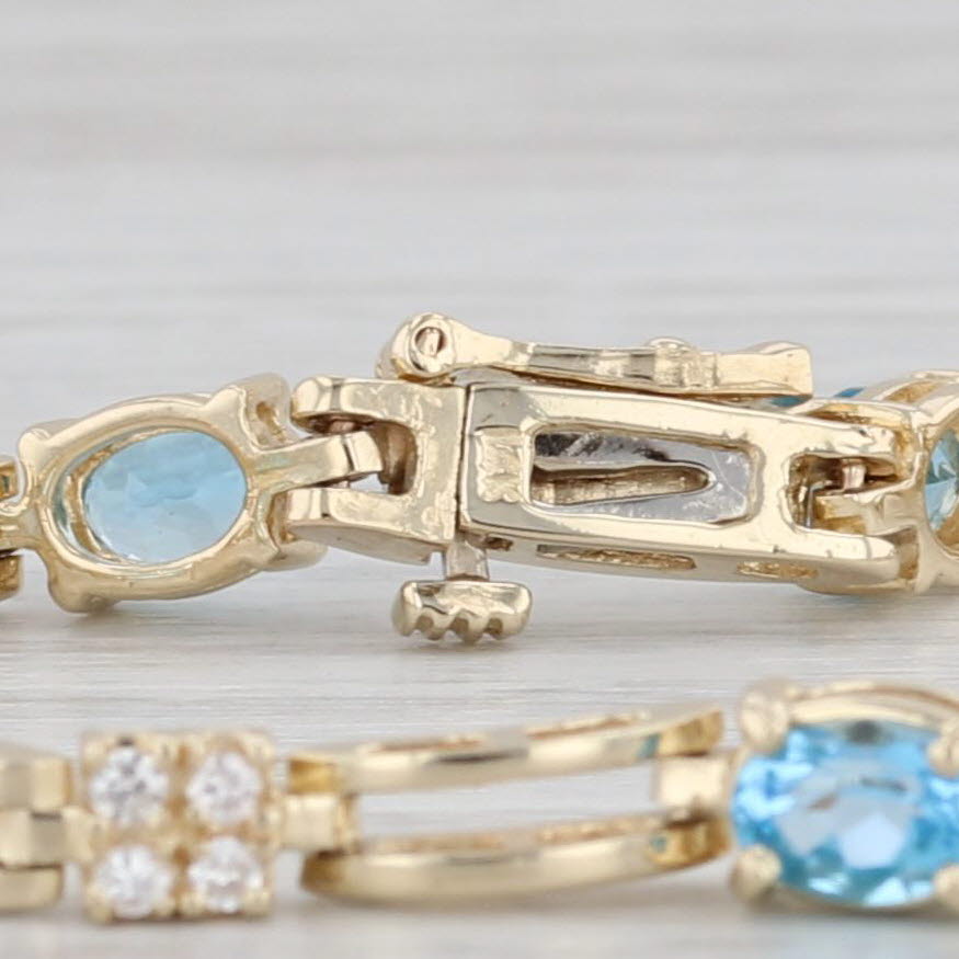 Gray 3.82ctw Oval Blue Topaz Diamond Tennis Bracelet 14k Yellow Gold 6.75" 4.5mm