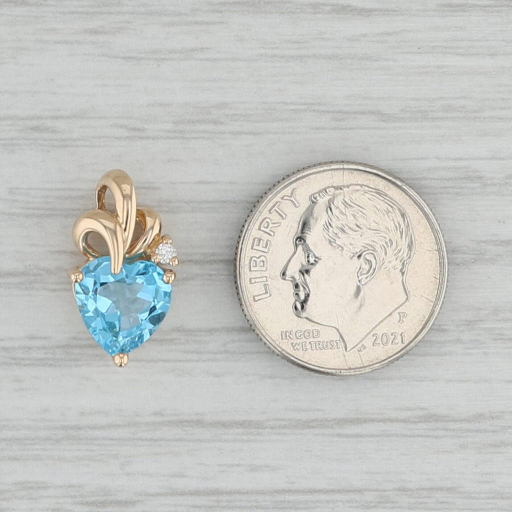 Gray 2.33ctw Blue Topaz Heart Pendant 14k Yellow Gold Diamond Accent