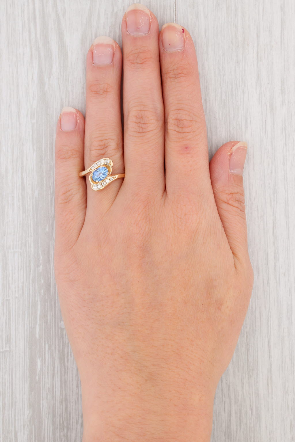 Gray 1.43ctw Light Blue Oval Sapphire Diamond Bypass Ring 14k Yellow Gold Size 7.25