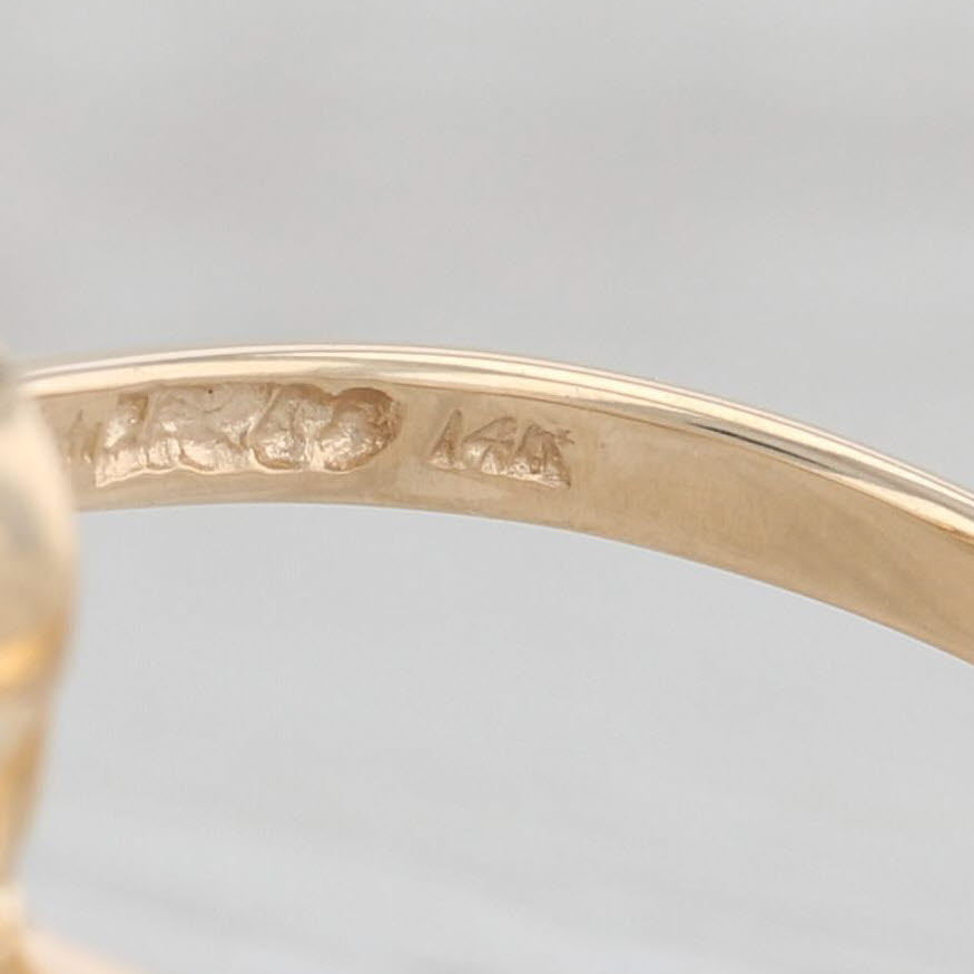 Light Gray 1.43ctw Light Blue Oval Sapphire Diamond Bypass Ring 14k Yellow Gold Size 7.25