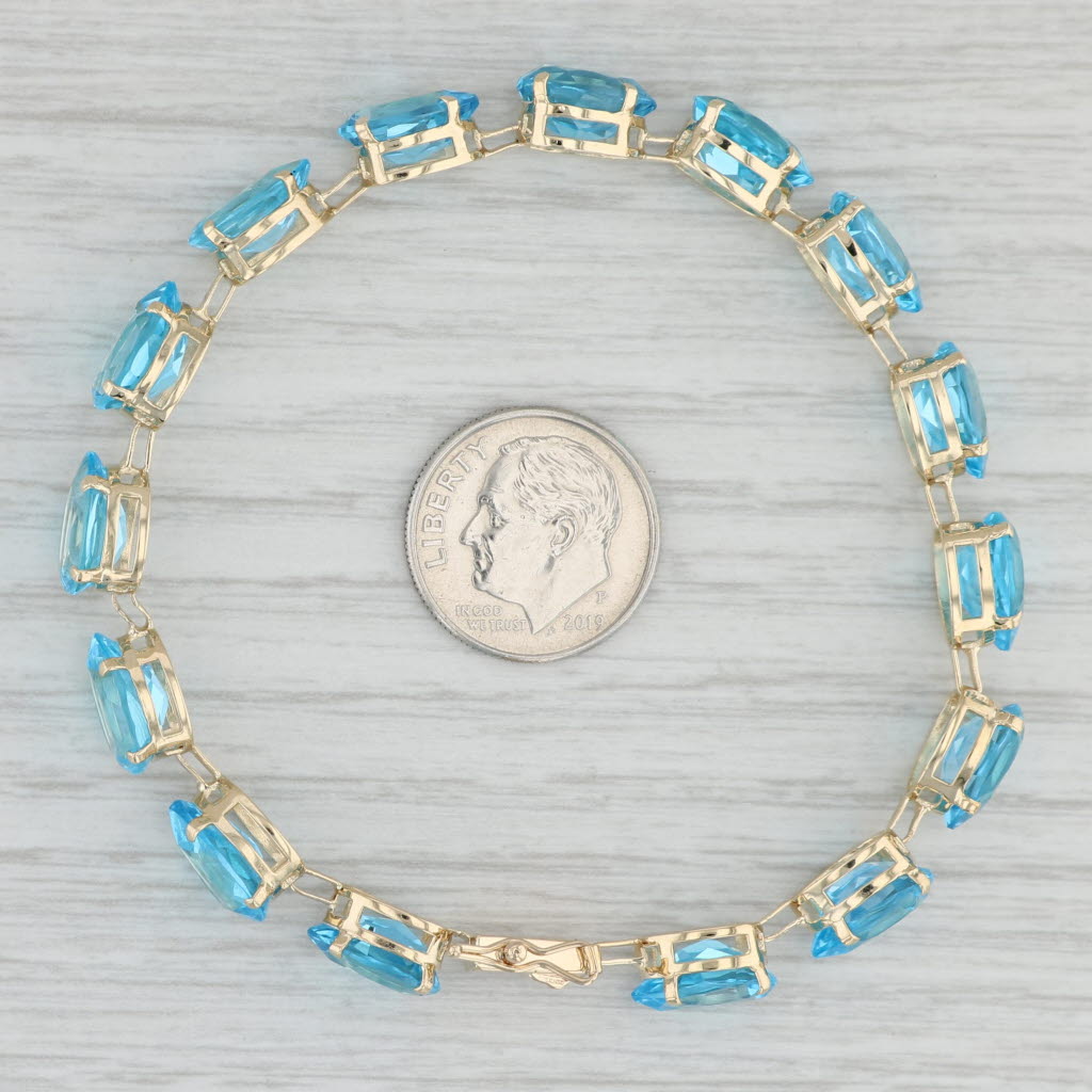 Gray 35ctw Blue Topaz Tennis Bracelet 14k Yellow Gold 7" 7mm