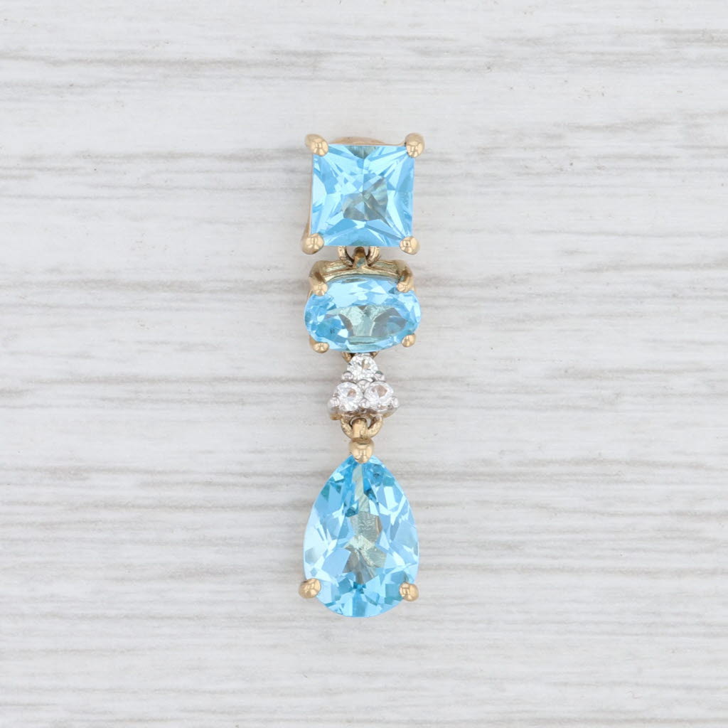 Light Gray New 5.89ctw Blue Topaz Synthetic White Sapphire Drop Pendant 10k Yellow Gold