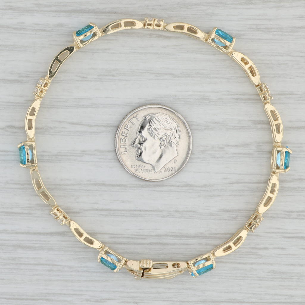 Gray 3.82ctw Oval Blue Topaz Diamond Tennis Bracelet 14k Yellow Gold 6.75" 4.5mm