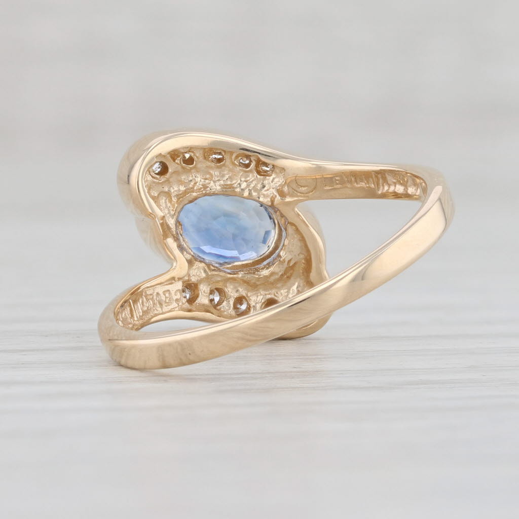 Light Gray 1.43ctw Light Blue Oval Sapphire Diamond Bypass Ring 14k Yellow Gold Size 7.25