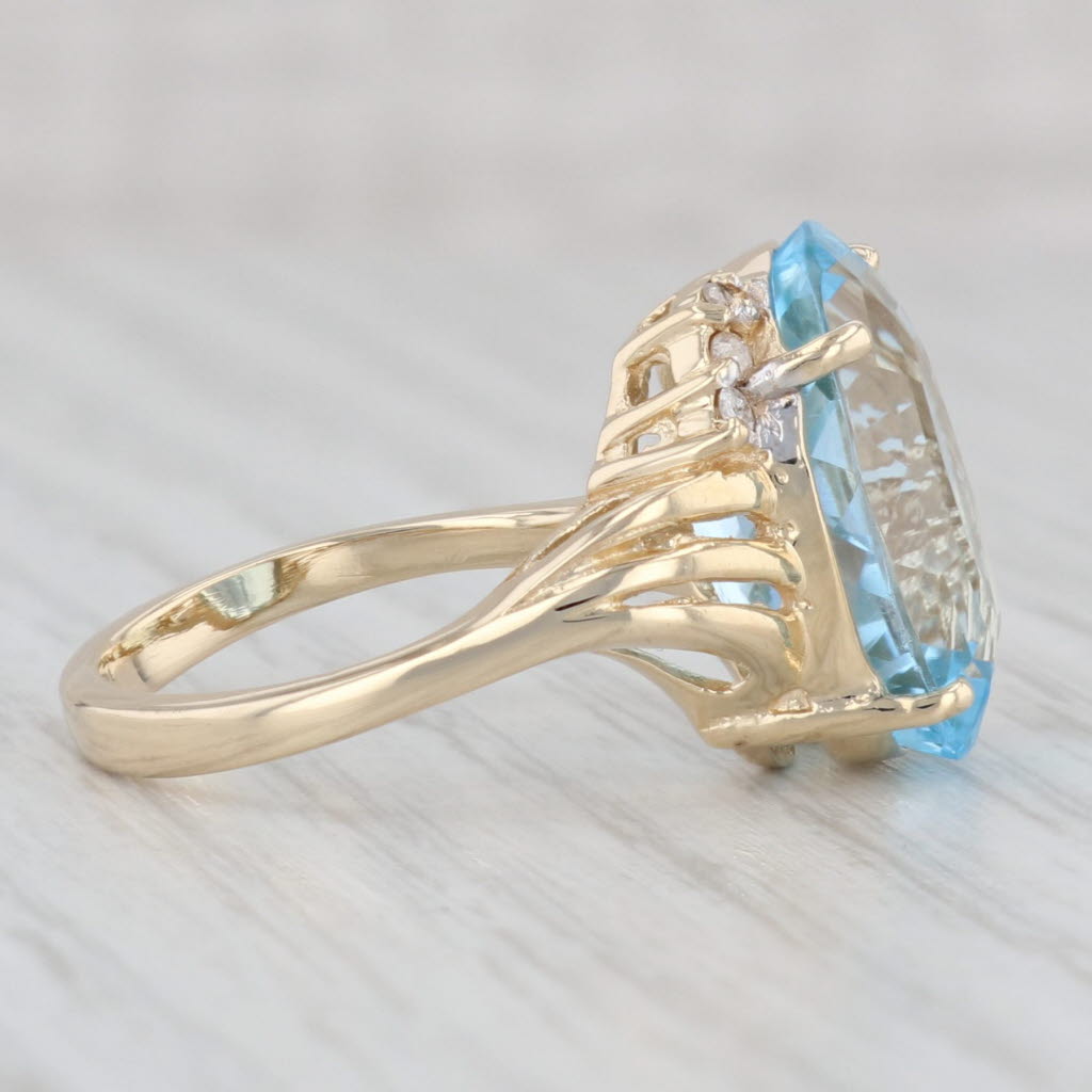 Light Gray 10.29ctw Oval Blue Topaz Diamond Ring 14k Yellow Gold Size 7.25 Bypass