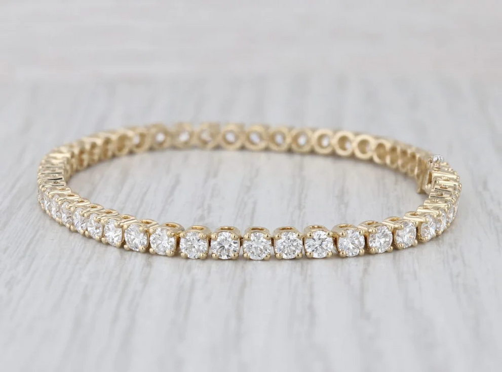 Diamond tennis bracelet in yellow gold from Jewelry Authority