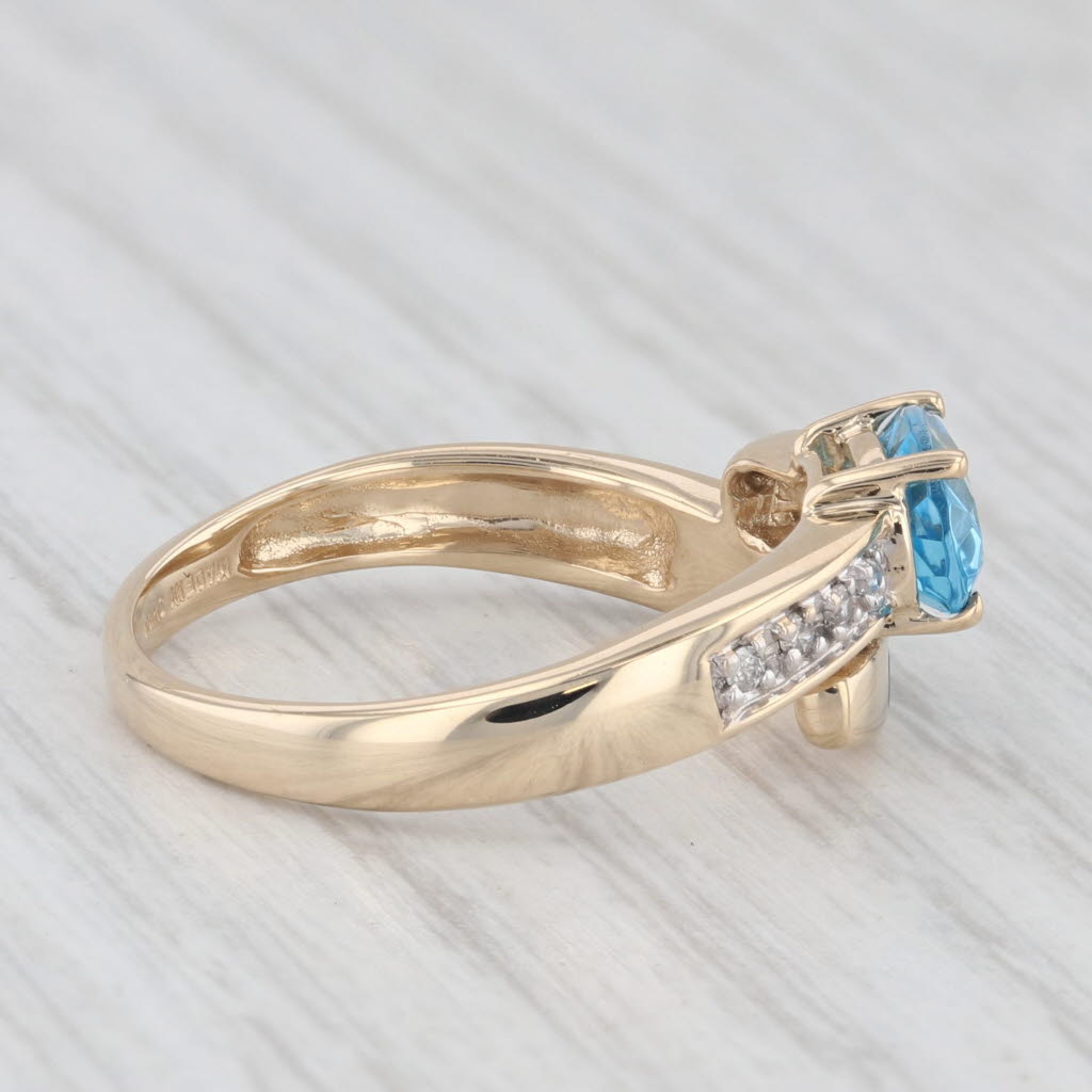 Light Gray 1.03ctw Blue Topaz Diamond Opal Bypass Ring 14k Yellow Gold Size 7