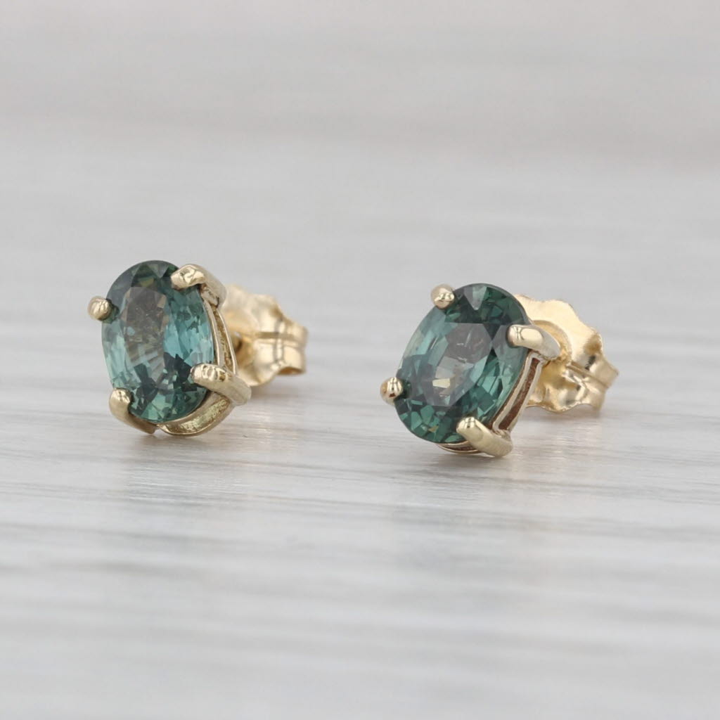 1.30ctw Color Change Sapphire Stud Earrings 10k Yellow Gold Oval Solitaire Studs