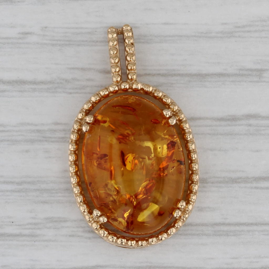 Gray Spangled Amber Oval Cabochon Solitaire Pendant 14k Yellow Gold