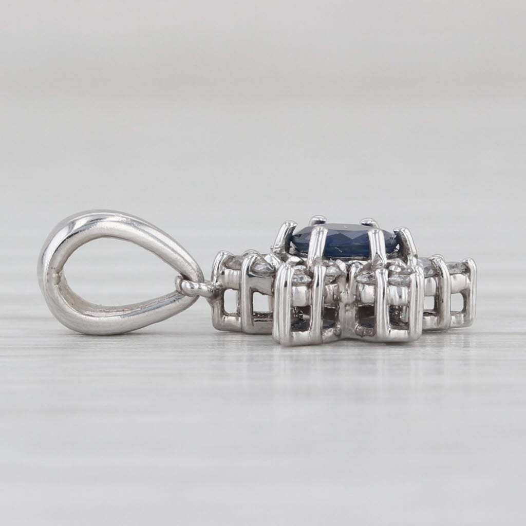 0.78ctw Blue Sapphire Diamond Halo Flower Pendant 14k White Gold