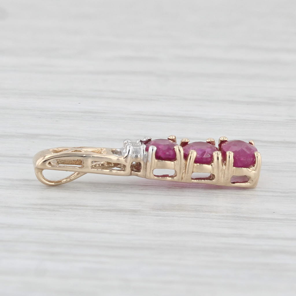 Light Gray 0.68ctw Ruby 3-Stone Journey Pendant 10k Yellow Gold