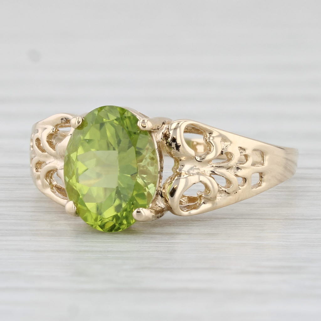 Light Gray 2.15ct Oval Peridot Solitaire Ring 10k Yellow Gold Size 8