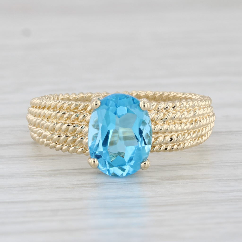 Light Gray 2.40ctw Oval Blue Topaz Solitaire Ring 14k Yellow Gold Size 8