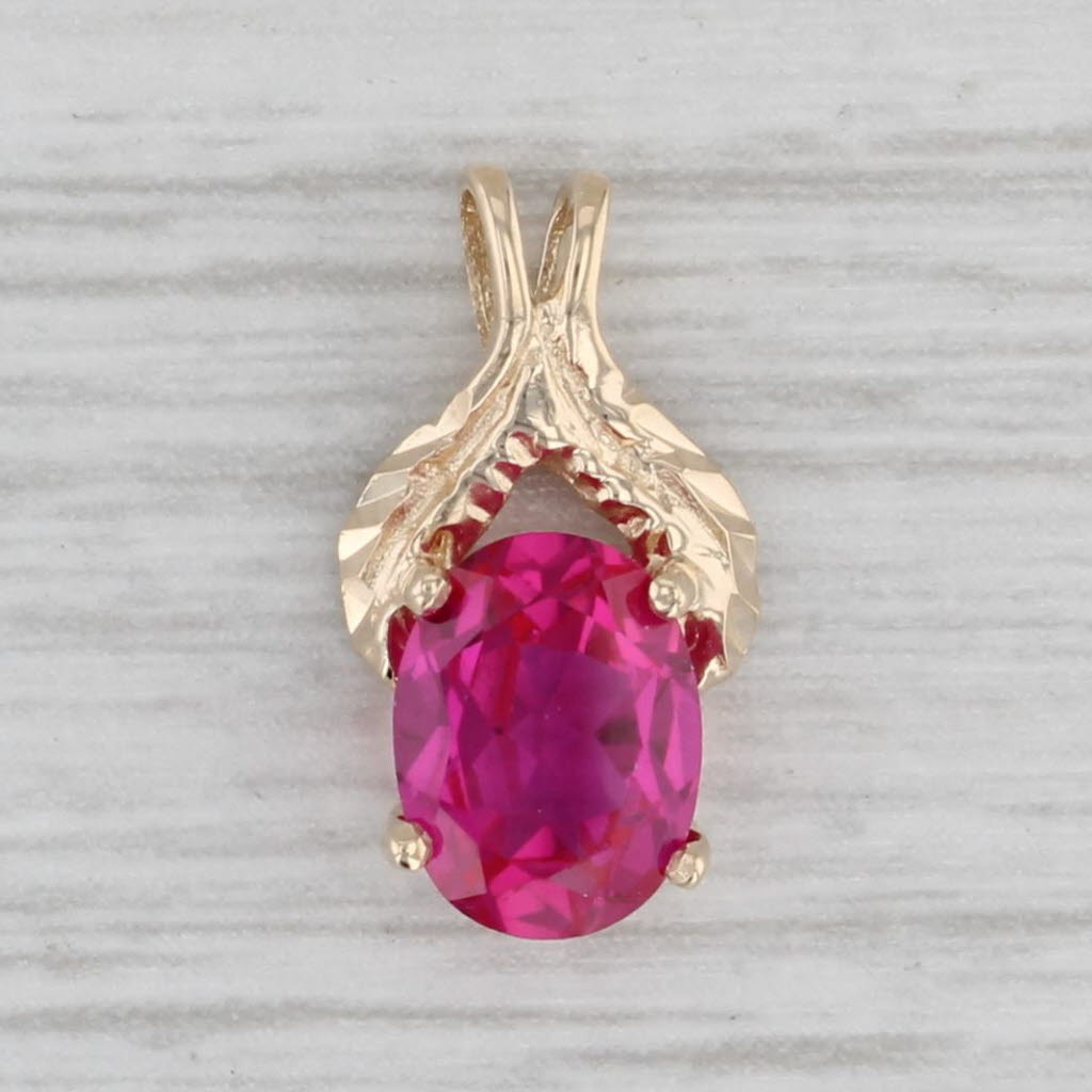 Gray 1.48ctw Lab Created Ruby Pendant 10k Yellow Gold Oval Solitaire