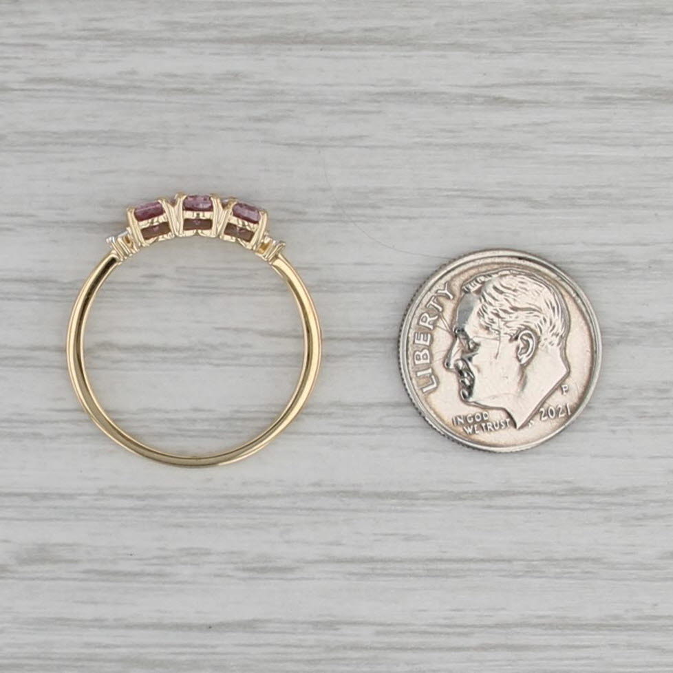 1.54ctw 3-Stone Pink Spinel Ring 10k Yellow Gold Size 9.25 Diamond Accents
