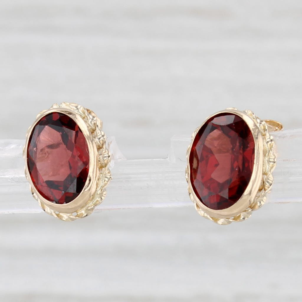 Light Gray 2.80ctw Oval Garnet Solitaire Stud Earrings 14k Yellow Gold