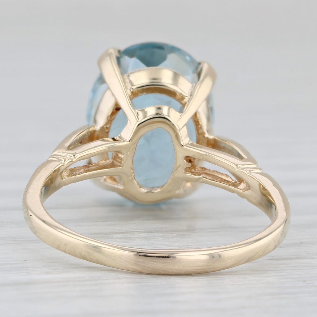 Light Gray 11.60ctw Oval Blue Topaz Solitaire Ring 10k Yellow Gold Size 9.5