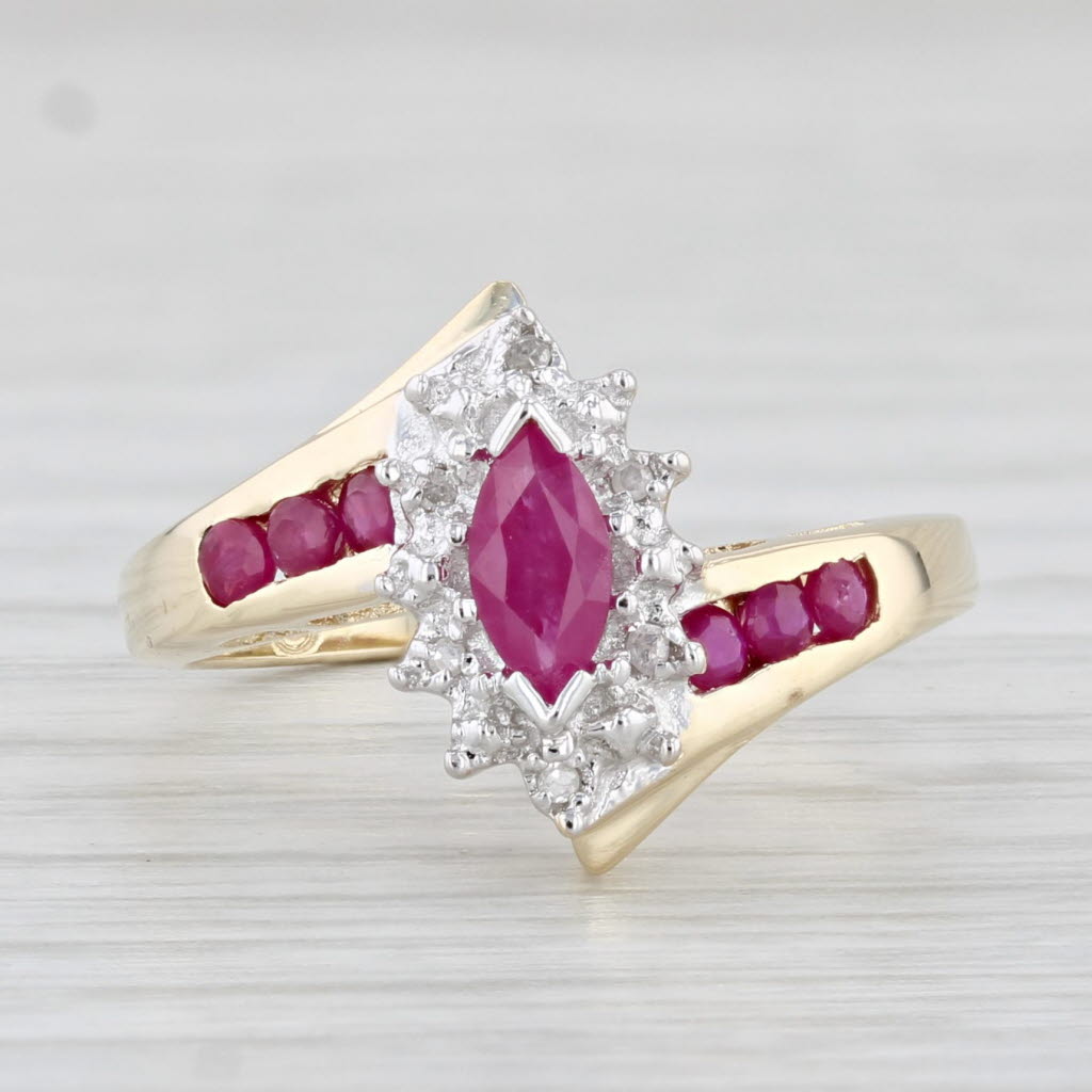 Light Gray 0.48ctw Marquise Ruby Halo Bypass Ring 10k Yellow Gold Size 6