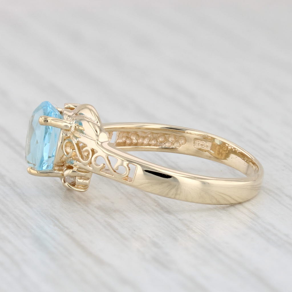 Light Gray 1.02ctw Oval Blue Topaz Diamond Ring 10k Yellow Gold Size 6.25