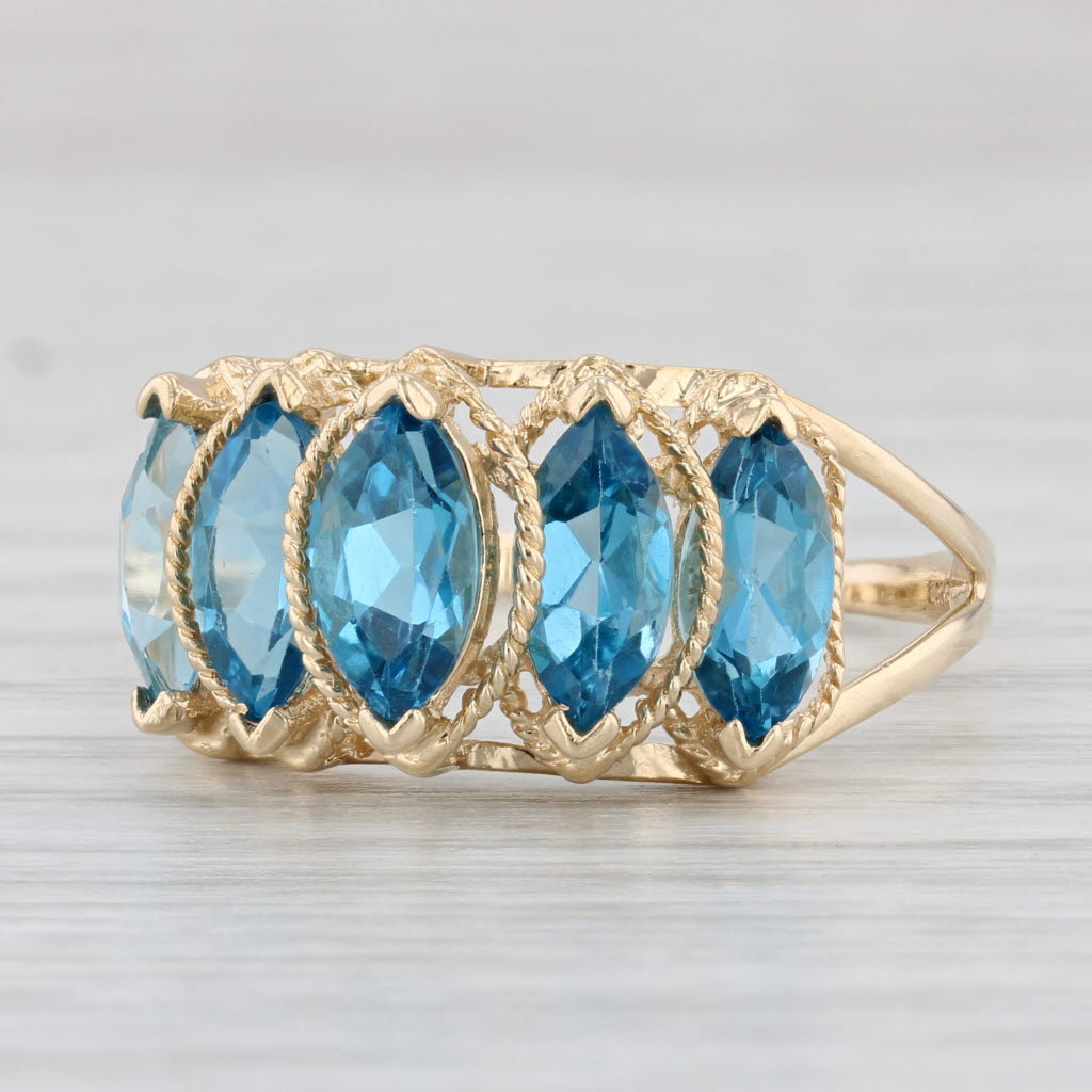 Light Gray 3.90ctw Tiered Marquise Blue Topaz Ring 14k Yellow Gold Size 10.5