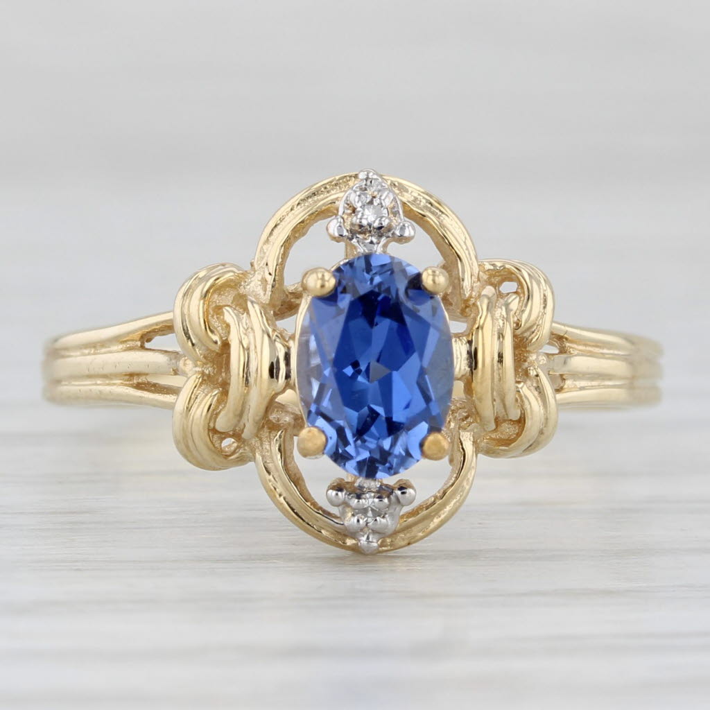 Light Gray 1.12ctw Oval Blue Lab Created Sapphire Diamond Ring 10k Yellow Gold Size 8.5