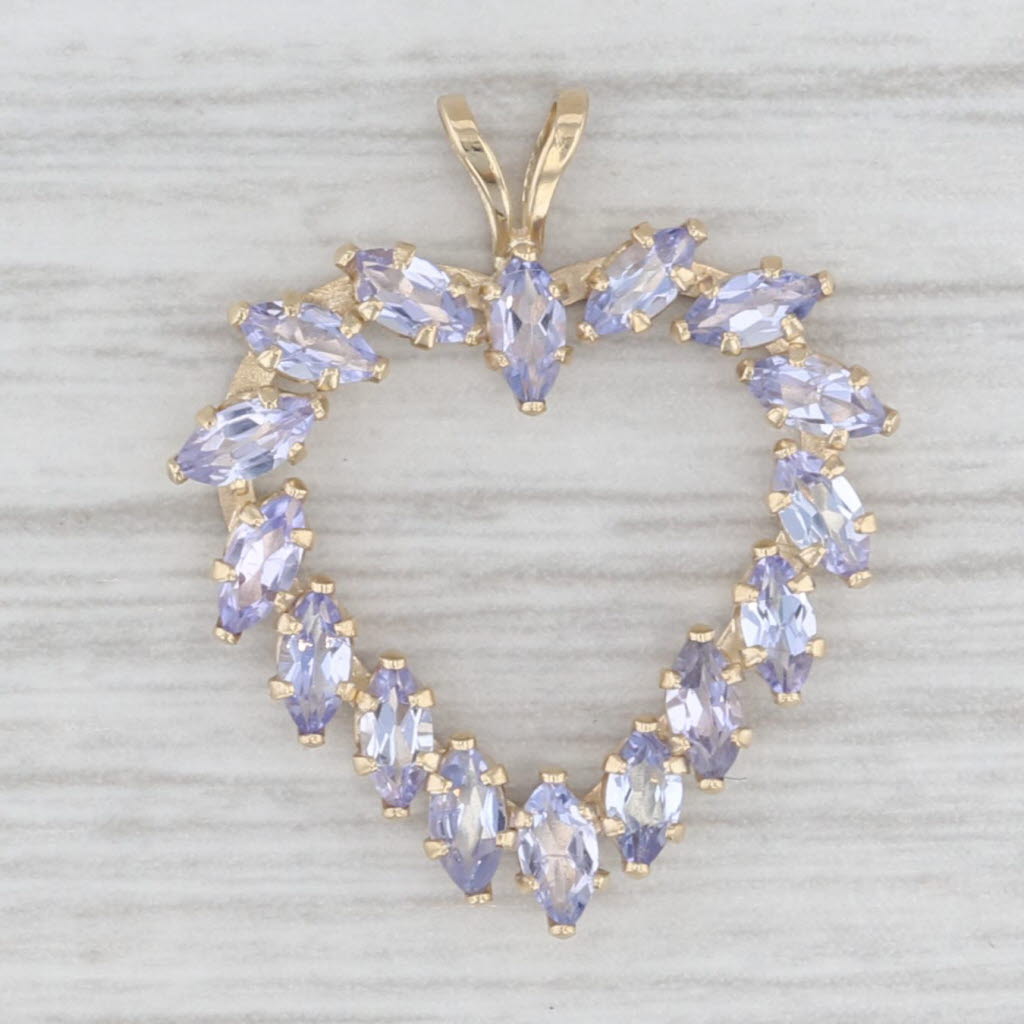 1.25ctw Tanzanite Open Heart Pendant 14k Yellow Gold