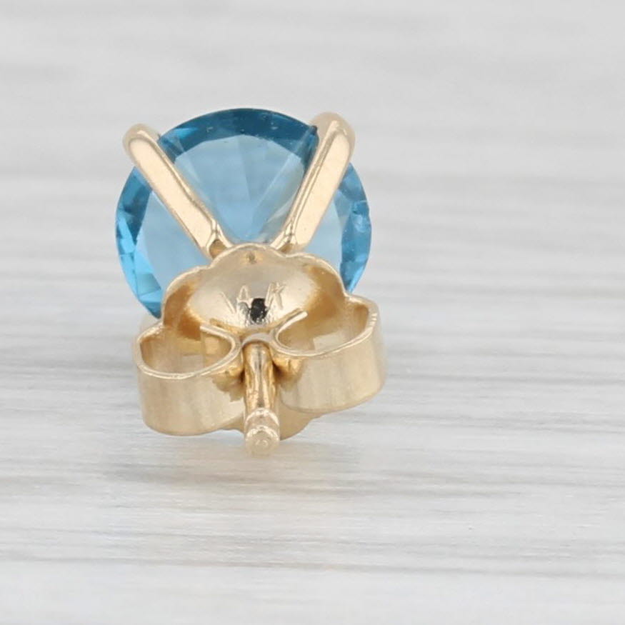 Light Gray 1.50ctw Lab Created Blue Spinel Stud Earrings 14k Yellow Gold