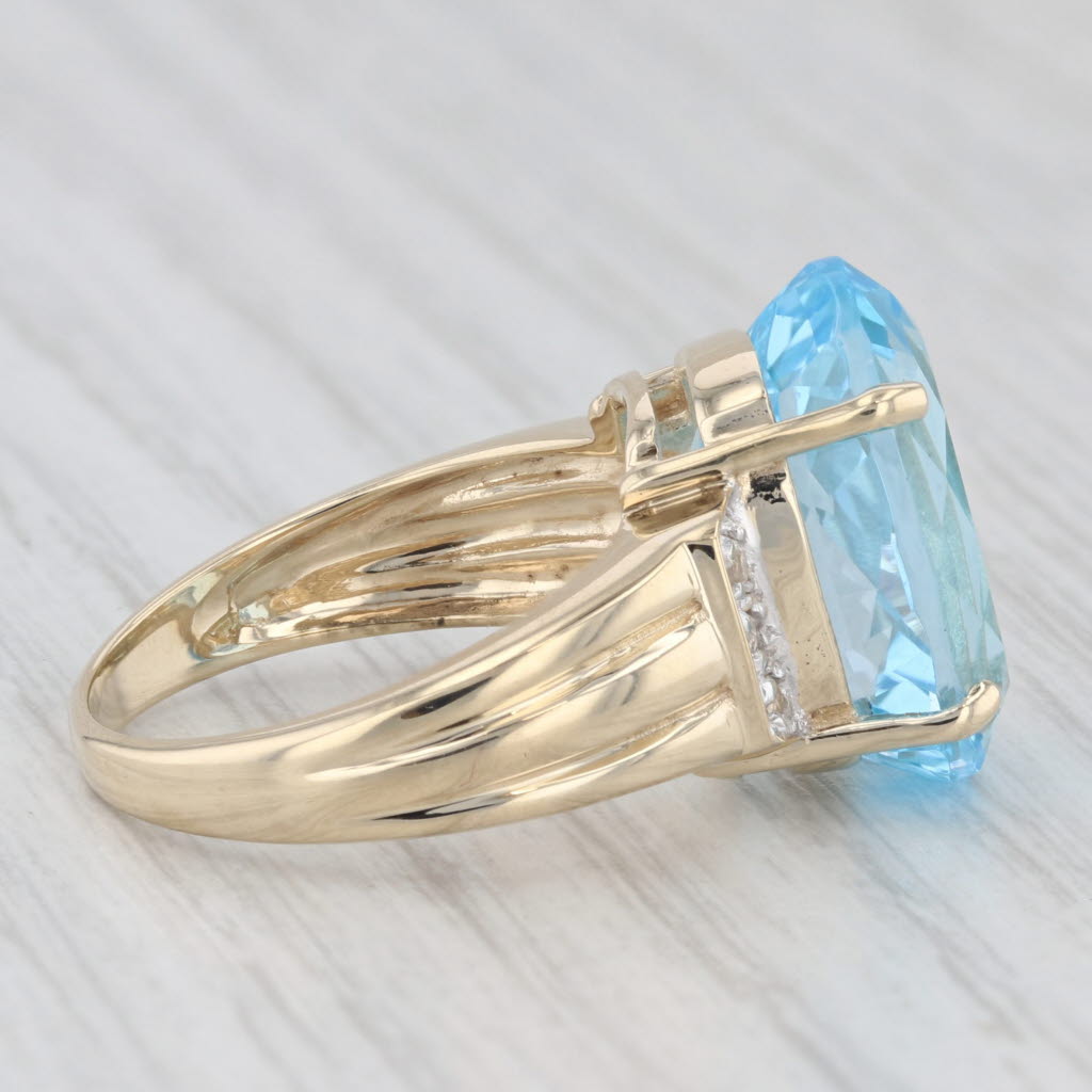 Light Gray 13.22ctw Blue & White Topaz Ring 9k Yellow Gold Large Oval Solitaire Size 7