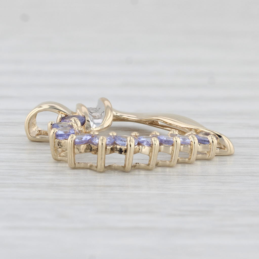 Light Gray 0.82ctw Tanzanite Diamond Open Heart Pendant 10k Yellow Gold