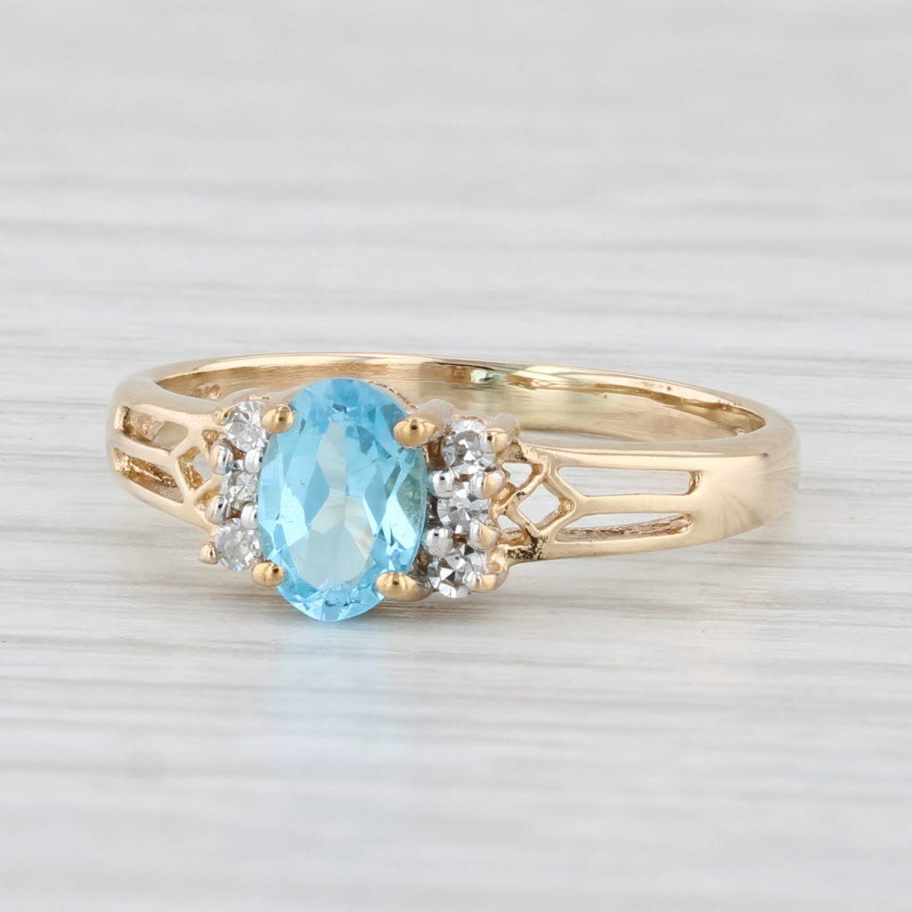 Light Gray Town & Country 0.59ctw Blue Topaz Diamond Ring 10k Yellow Gold Size 5.25